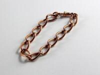 An early 20thC 9ct rose gold curb link bracelet