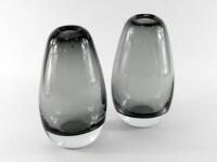 A pair of Scandinavian style smoked glass bud vases