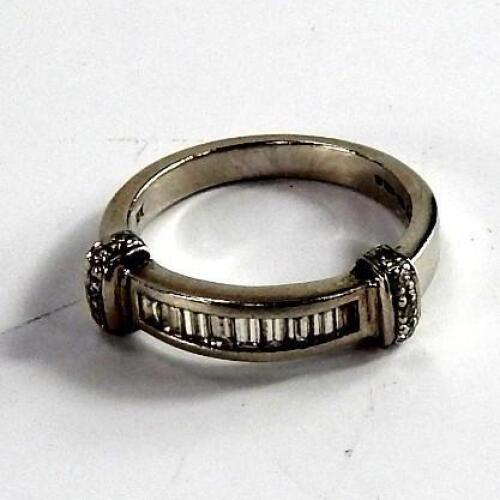 A platinum and diamond set ring