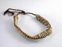 Tribal Art. A 19thC tribal shell necklace probably from the South Seas