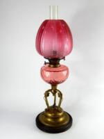 A Victorian brass and glass paraffin lamp