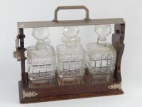 A 1930s oak tantalus