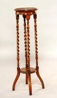 A Victorian style plant stand