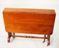 A late Victorian walnut Sutherland table