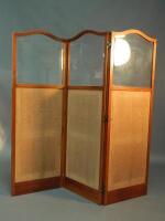 A mahogany framed three fold screen