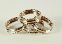 A cased set of four Victorian silver napkin rings