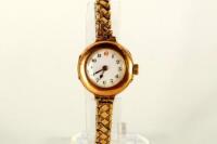 A 9ct gold early 20thC trench style wristwatch