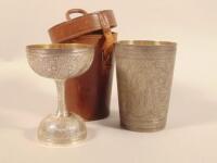 An Indian silver plated stirrup type cup set