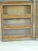 A pair of Lebus oak sectional bookcases - 2