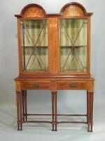 An Edwardian mahogany and marquetry corner cabinet