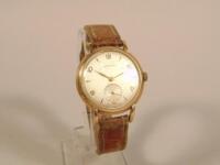 A gentleman's Longines 9ct gold cased wristwatch