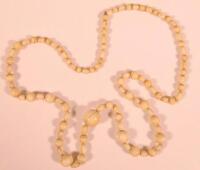 An ivory beaded necklace