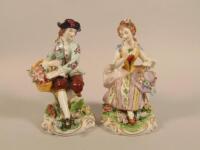 A pair of 20thC German porcelain figures