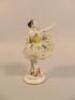 A Dresden porcelain crinoline figure