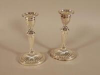 A pair of Carrs of Sheffield silver candlesticks