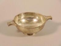 A modern silver two handled quaich