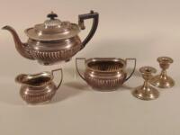 A silver plated three piece part fluted tea set