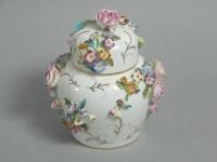 A Coalbrookdale style flower encrusted porcelain jar and cover