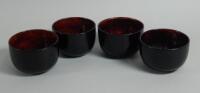 A set of four oriental lacquer finger bowls