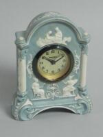 A German porcelain mantel timepiece