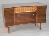 A Uniflex mahogany retro style inverted breakfront sideboard