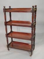 A Victorian mahogany four tier what not