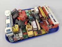 A large quantity of play worn die-cast vehicles