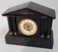 A 19thC French black marble portico shaped mantel clock