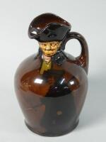 A Royal Doulton whiskey flask after Charles Noke