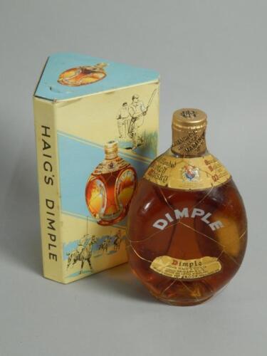 A bottle of Hague Dimple whiskey