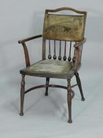 An Edwardian Art Nouveau style open armchair