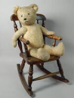 A 19thC child's spindle back rocking chair