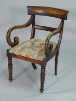 An early 19thC mahogany carver type chair