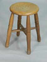 A contemporary Arts & Crafts style turned oak stool