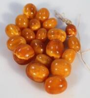 Various polished amber beads