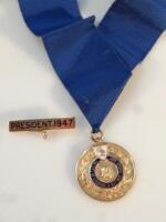 A yellow metal and part enamel Liverpool Presidential Butcher's Association Medal