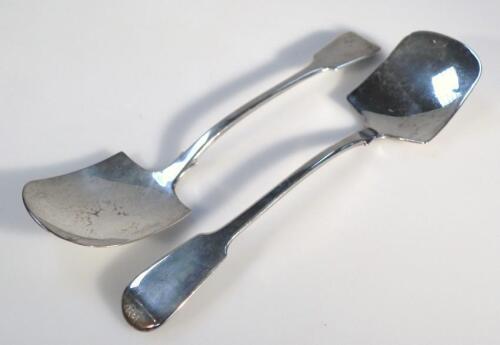 A pair of Victorian silver serving scoops