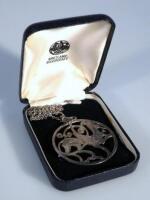 A Queen Elizabeth II Edinburgh silver commemorative pendant