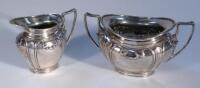 An Edwardian silver Art Nouveau part tea service