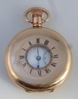 A gold plated half hunter pocket watch