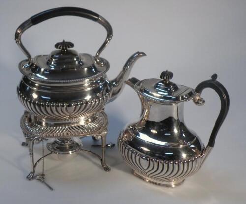 An early 20thC silver plated spirit kettle