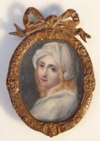 19thC School. Portrait miniature of a lady quarter profile on ivory