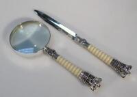 A presentation magnifying glass and paper knife