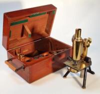 An early 20thC J Swift & Son brass microscope