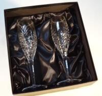 A pair of Royal Doulton crystal champagne flutes