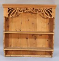 A set of stripped and lightly polished reconstituted pine hanging shelves