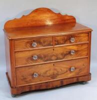 A Victorian flame mahogany chest