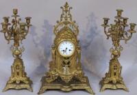 An ormolu style clock garniture