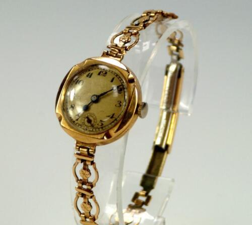 A 1920s 9ct gold Buren ladies cocktail watch