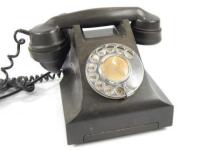 A GPO FD1 bakelite telephone.